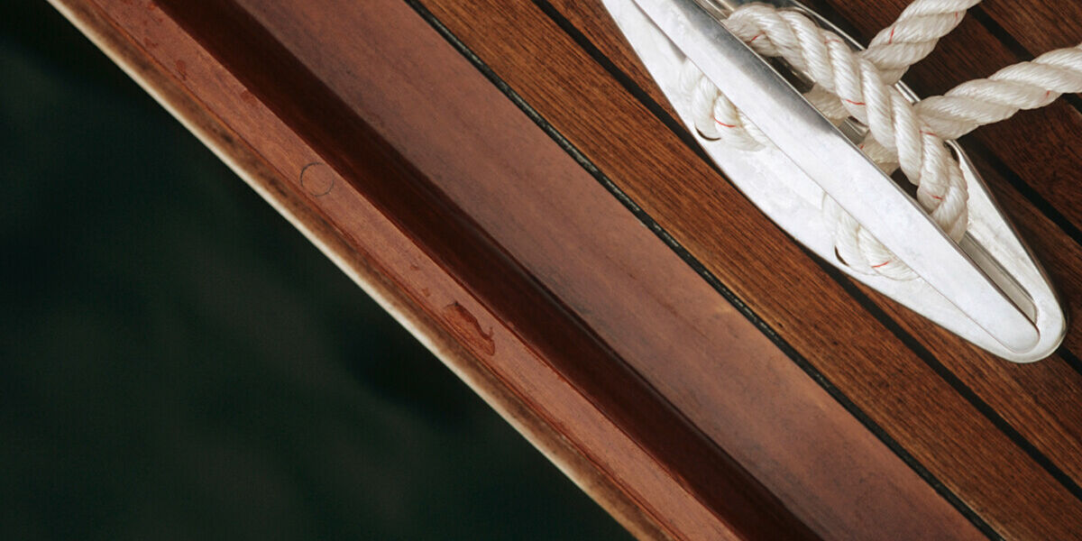 close-up-of-rope-tied-to-teak-